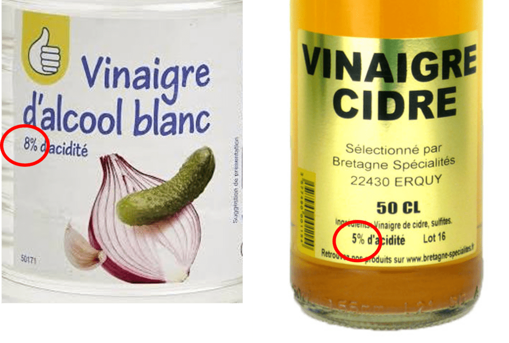 photo avec des étiquettes de bouteilles de vinaigre indiquant le degré d'acidité.
